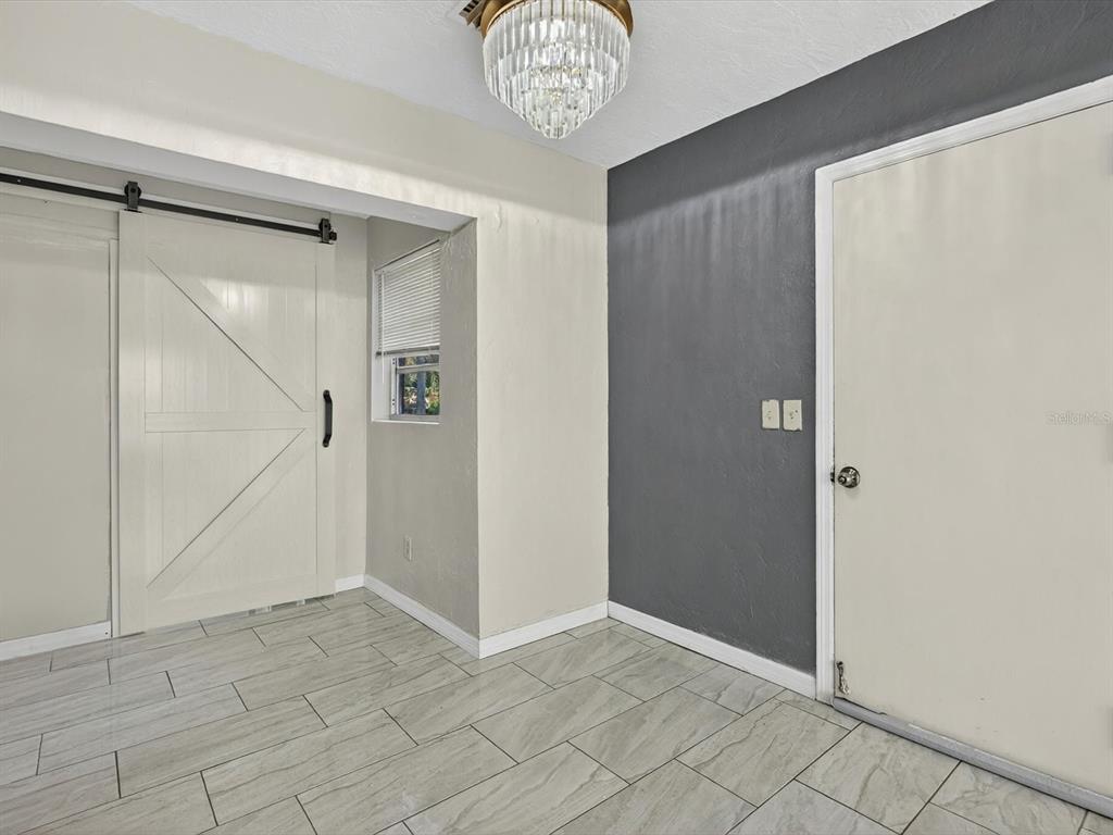 1068 Peter Road Daytona Beach, FL 32114 - Photo 10 of 37 a view of an empty room