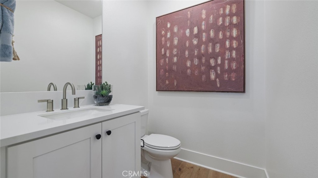 21381 Cloud Ridge Yorba Linda, CA 92887 - Photo 14 of 38 a bathroom with a sink vanity mirror and toilet