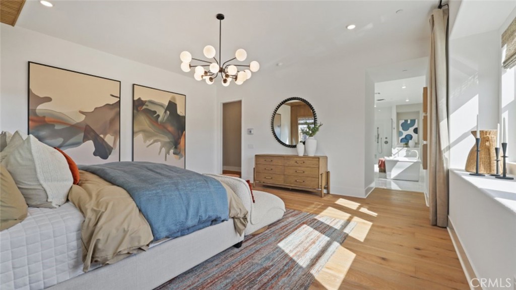21381 Cloud Ridge Yorba Linda, CA 92887 - Photo 16 of 38 a bedroom with a bed mirror on desk and a window