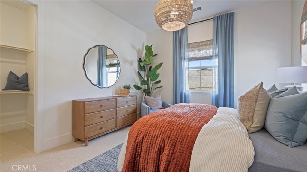 21381 Cloud Ridge Yorba Linda, CA 92887 - Photo 21 of 38 a bedroom with a bed mirror and a window
