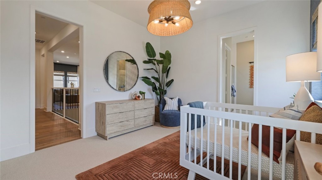 21381 Cloud Ridge Yorba Linda, CA 92887 - Photo 27 of 38 a bedroom with furniture and a mirror