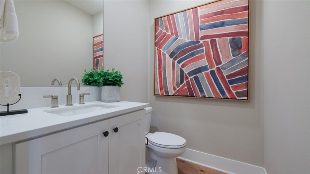 21381 Cloud Ridge Yorba Linda, CA 92887 - Photo 30 of 38 a bathroom with a sink and a toilet