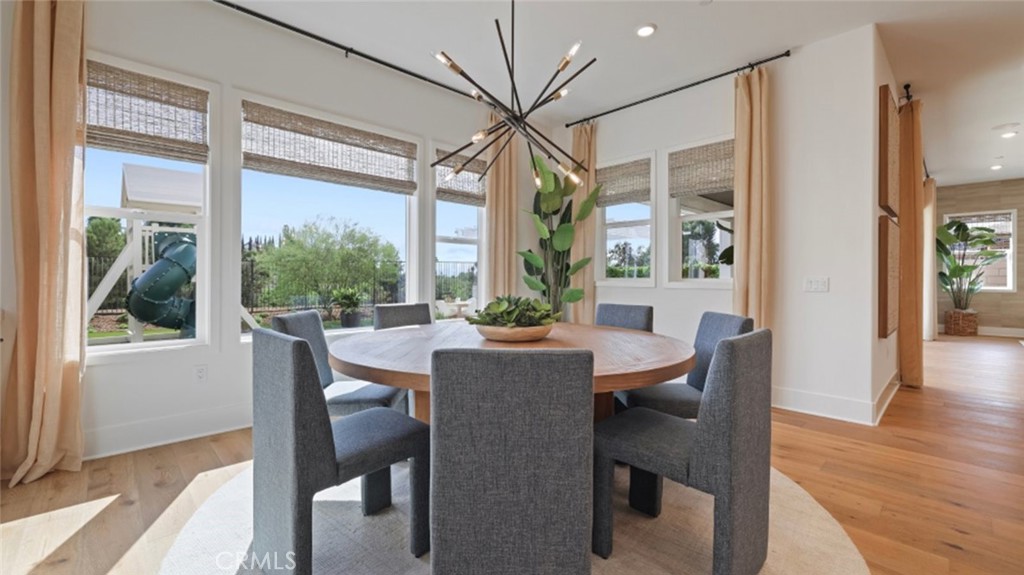 21381 Cloud Ridge Yorba Linda, CA 92887 - Photo 8 of 38 a view of a dining room with furniture window and wooden floor