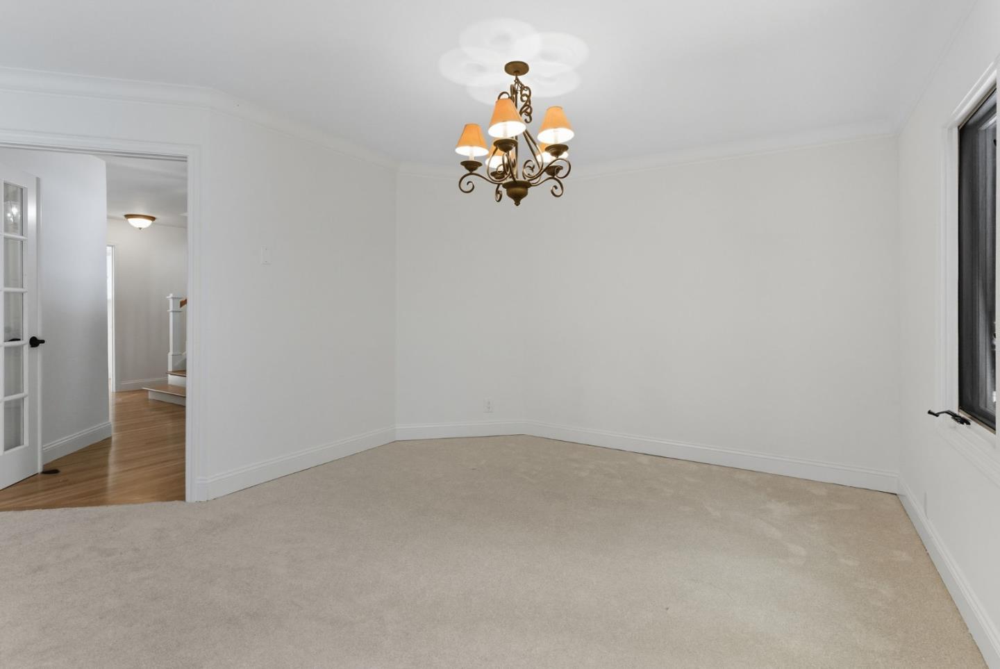 23489 Hutchinson Road Los Gatos, CA 95033 - Photo 12 of 46 a very nice looking room with a chandelier