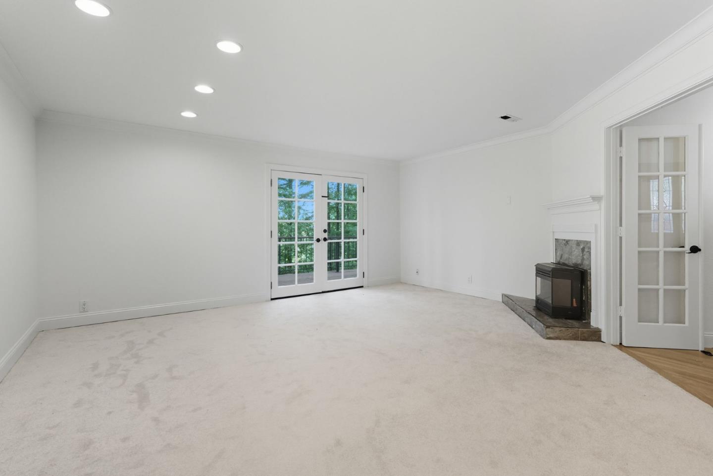23489 Hutchinson Road Los Gatos, CA 95033 - Photo 14 of 46 a view of an empty room with a window