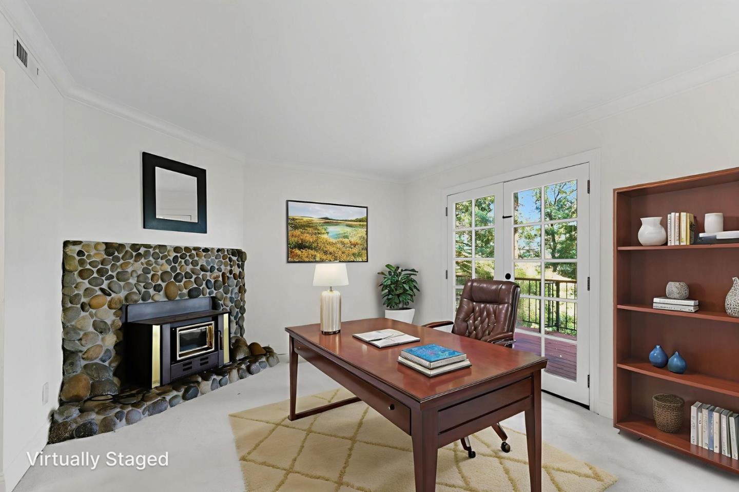 23489 Hutchinson Road Los Gatos, CA 95033 - Photo 15 of 46 a living room with furniture a rug and a fireplace
