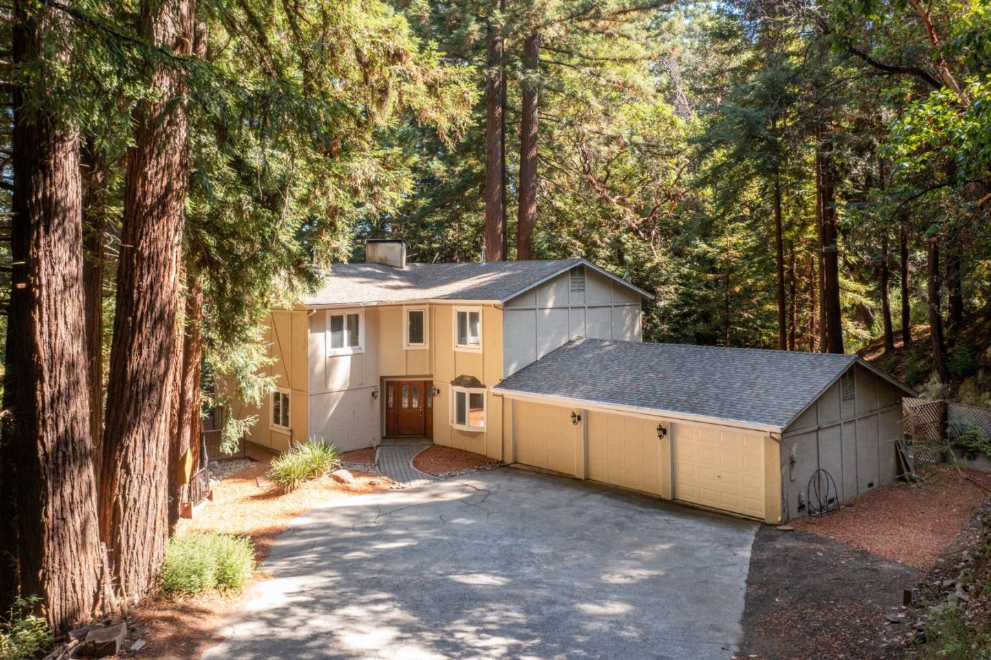 23489 Hutchinson Road Los Gatos, CA 95033 - Photo 2 of 46 a view of a house with a yard