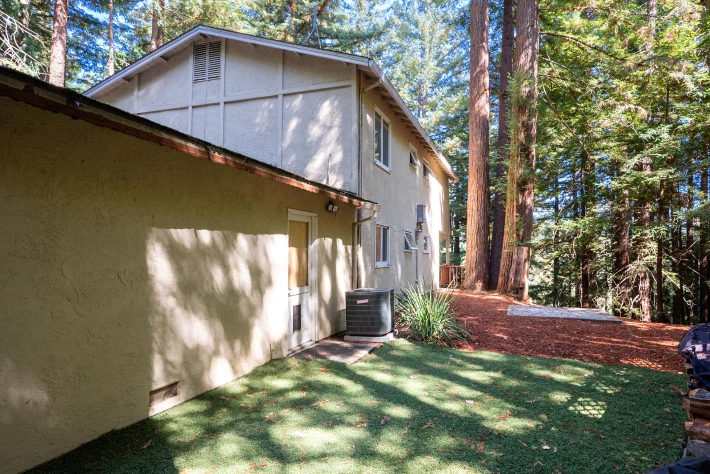23489 Hutchinson Road Los Gatos, CA 95033 - Photo 34 of 46 a view of a house with a yard