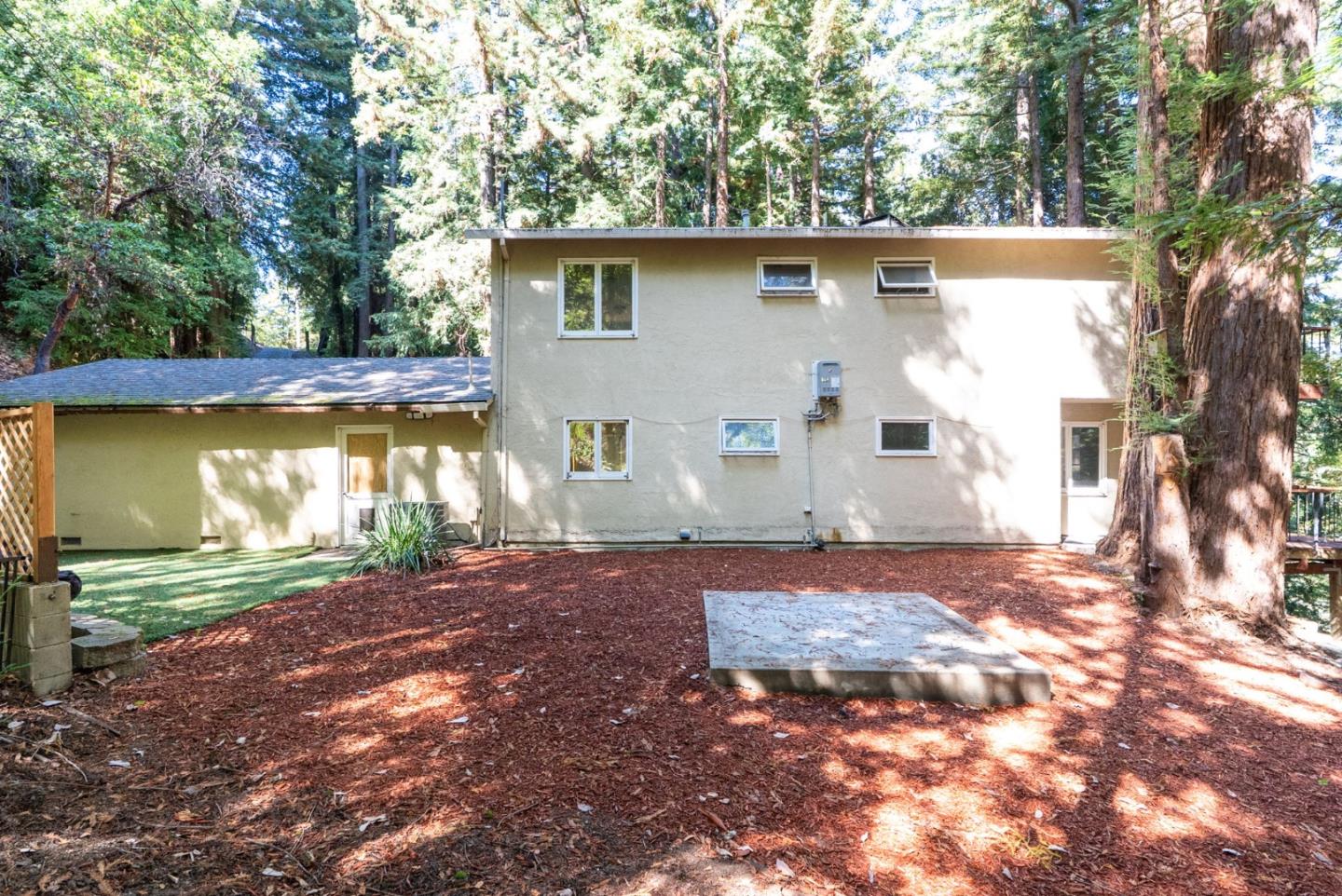 23489 Hutchinson Road Los Gatos, CA 95033 - Photo 35 of 46 a view of a house with a yard