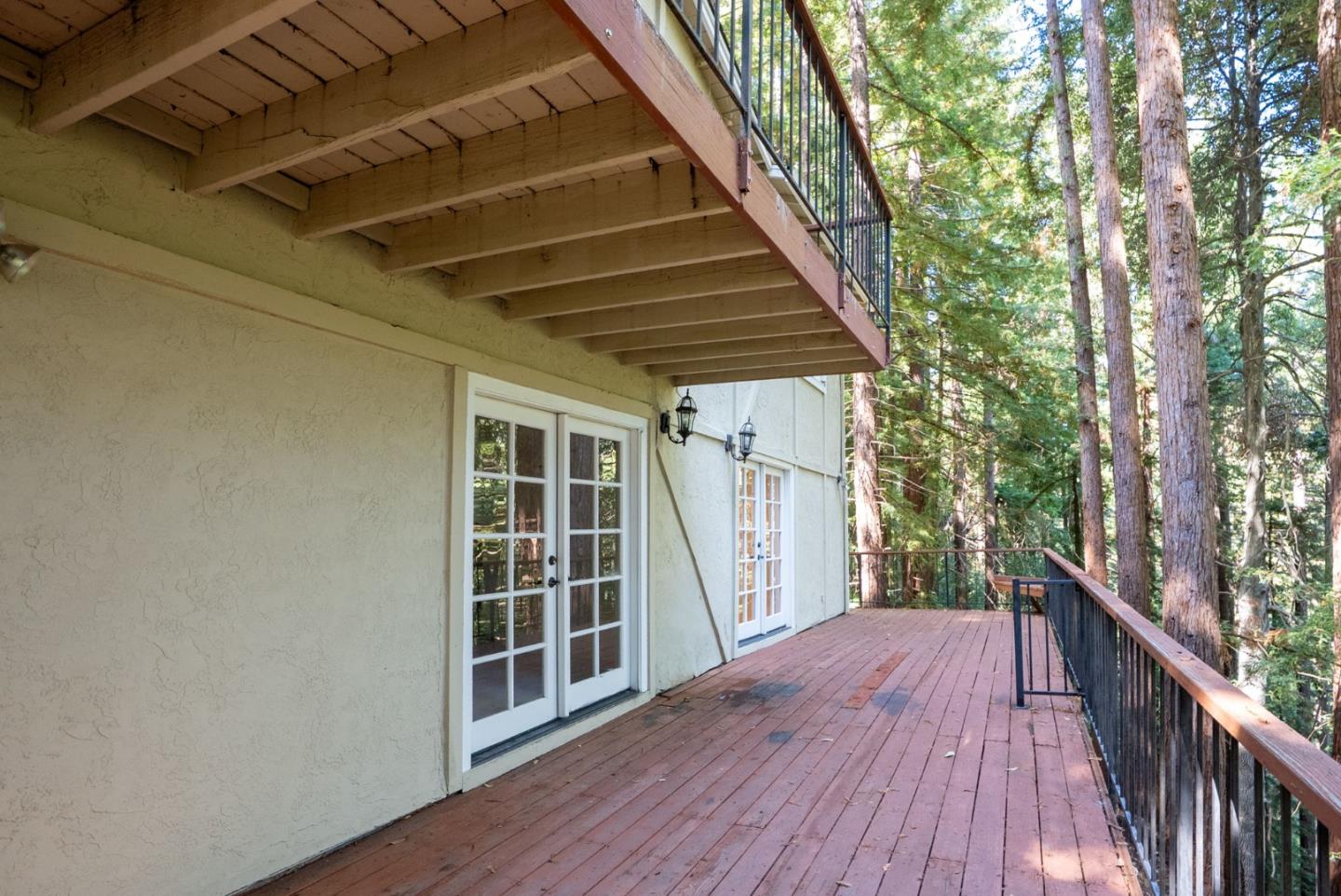 23489 Hutchinson Road Los Gatos, CA 95033 - Photo 37 of 46 a view of balcony with wooden floor and fence