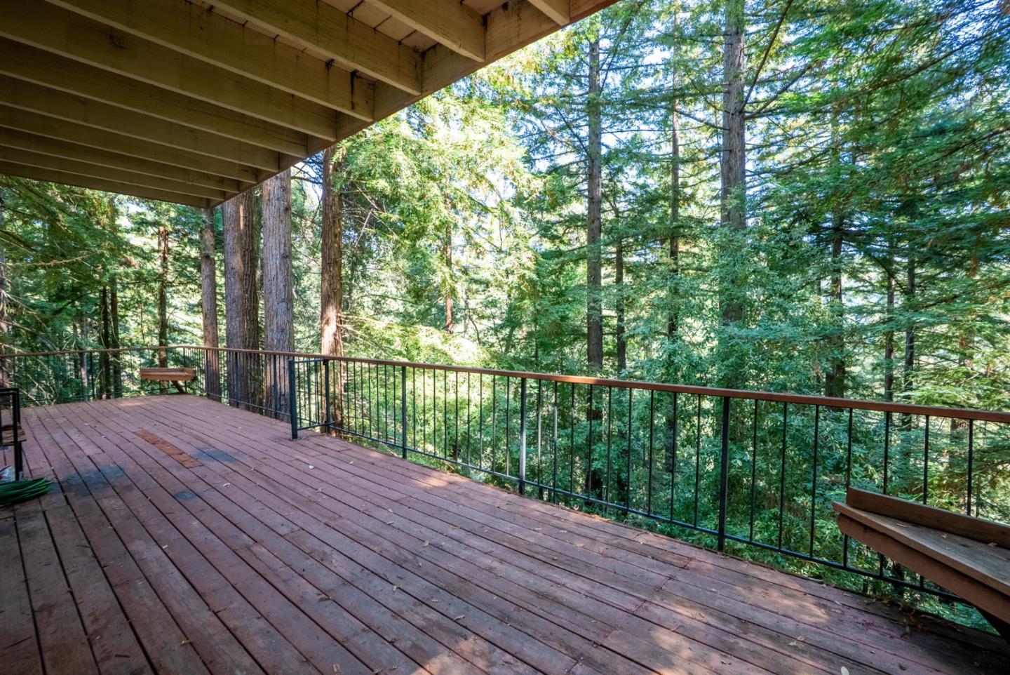 23489 Hutchinson Road Los Gatos, CA 95033 - Photo 38 of 46 a balcony with wooden floor and outdoor space