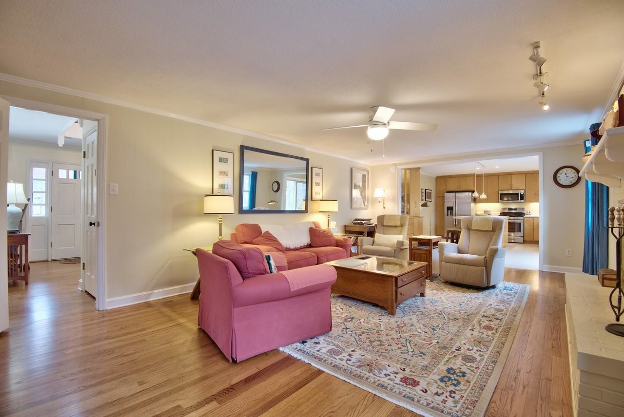 3563 Hamstead Court Durham, NC 27707 - Photo 14 of 37 a living room with furniture and wooden floor