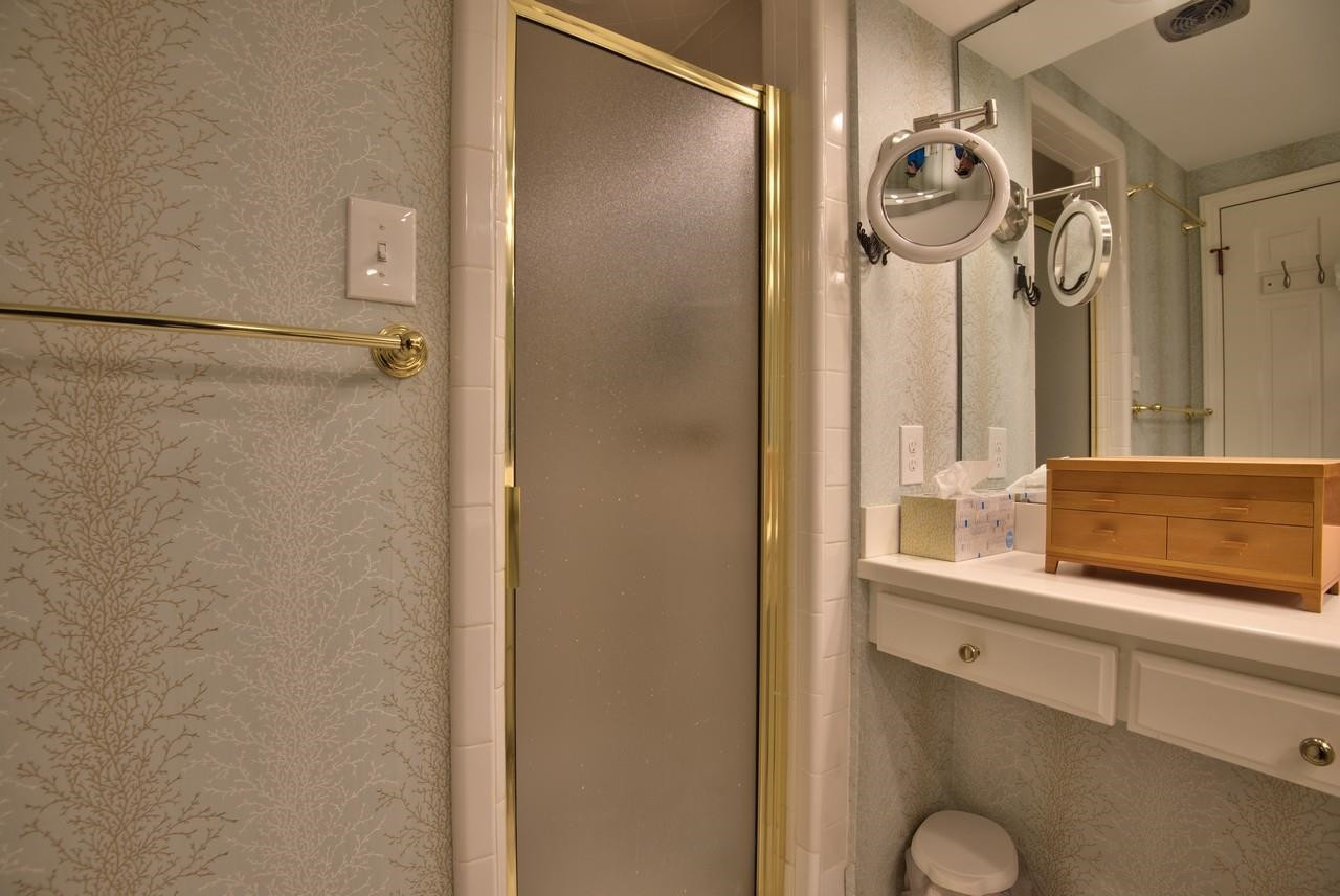 3563 Hamstead Court Durham, NC 27707 - Photo 22 of 37 a bathroom with a sink and a mirror