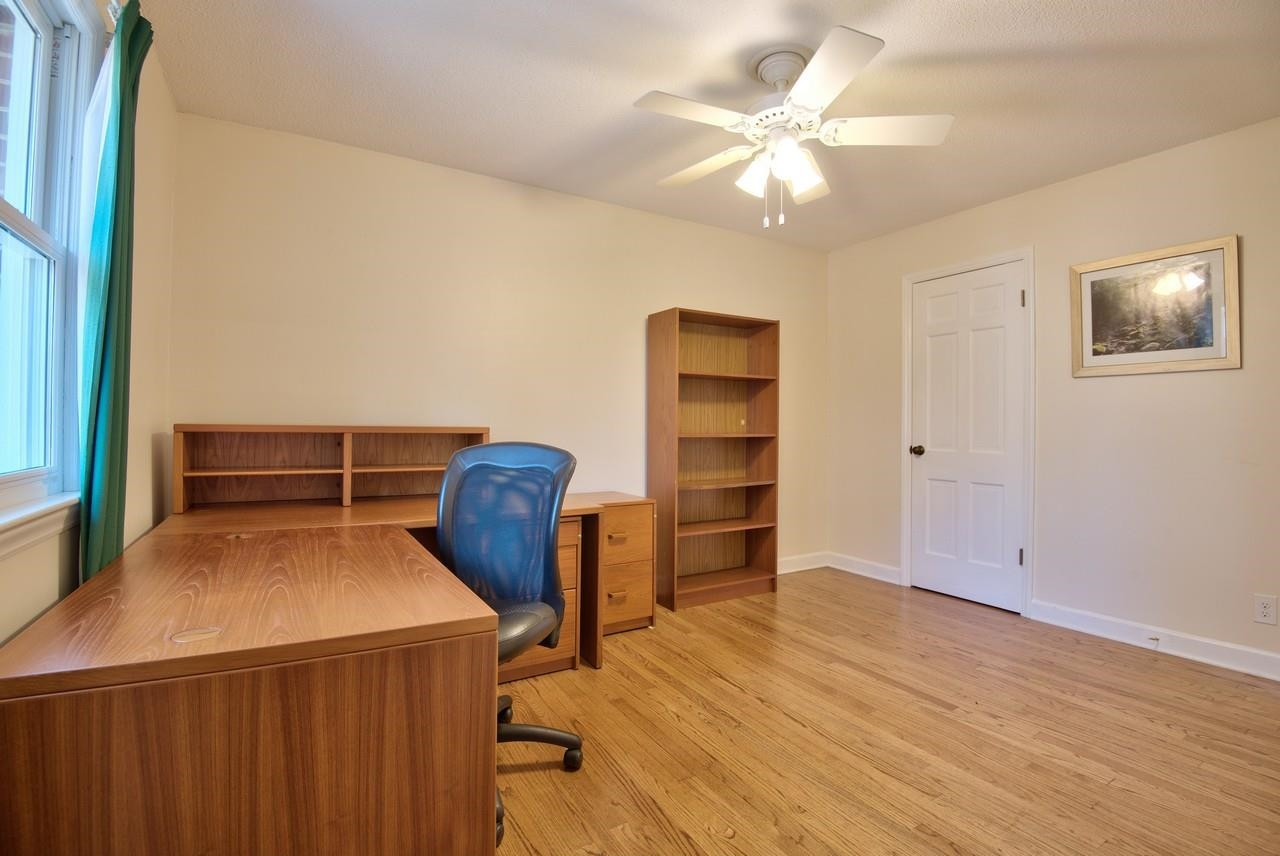 3563 Hamstead Court Durham, NC 27707 - Photo 28 of 37 a view of room with furniture and wooden floor