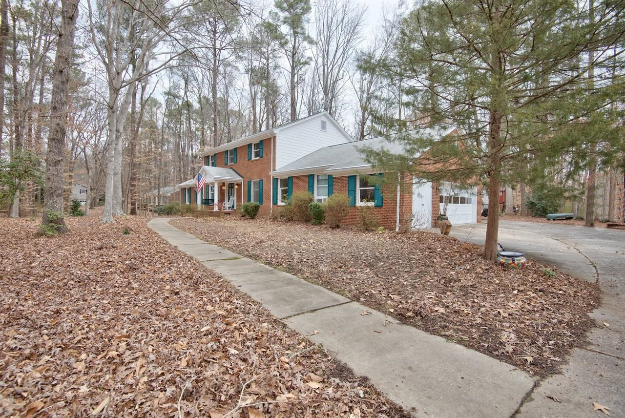 3563 Hamstead Court Durham, NC 27707 - Photo 3 of 37 front view of a house with a yard