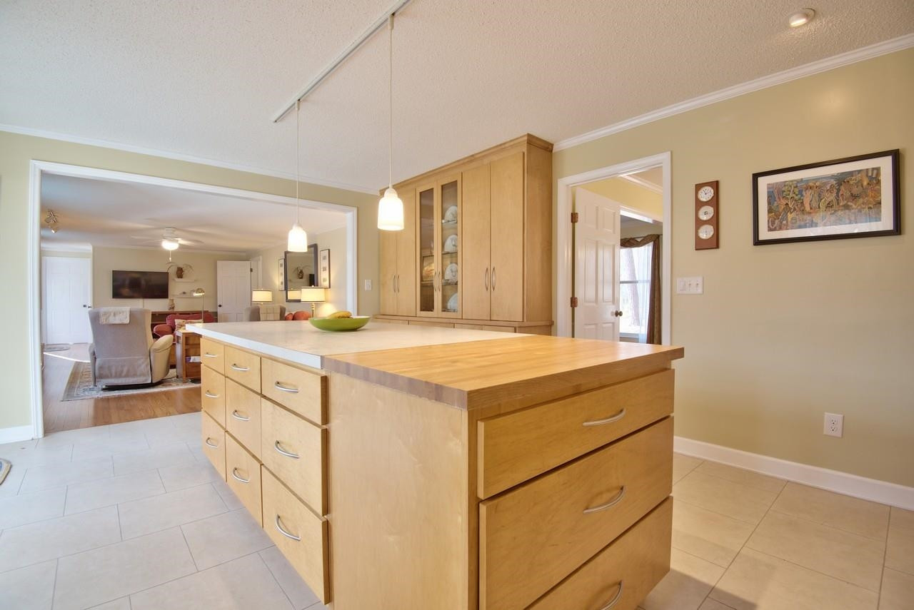 3563 Hamstead Court Durham, NC 27707 - Photo 10 of 37 a spacious bathroom with a granite countertop sink mirror and a