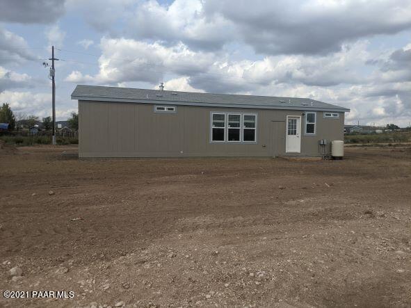 425 West Antelope Run Road Paulden, AZ 86334 - Photo 4 of 16 a view of a house with a backyard