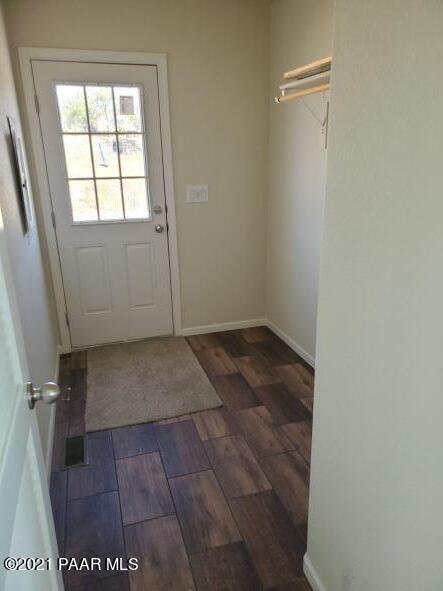 425 West Antelope Run Road Paulden, AZ 86334 - Photo 9 of 16 an empty room with a door