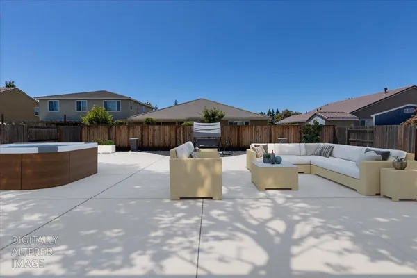 a swimming pool with outdoor seating