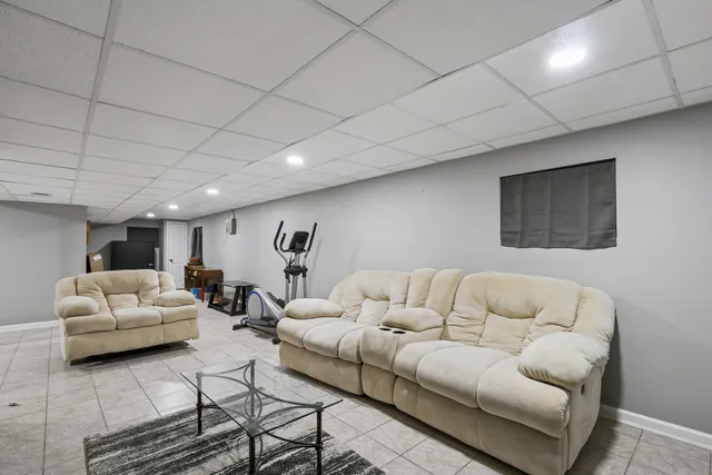 a huge green field with lots of trees