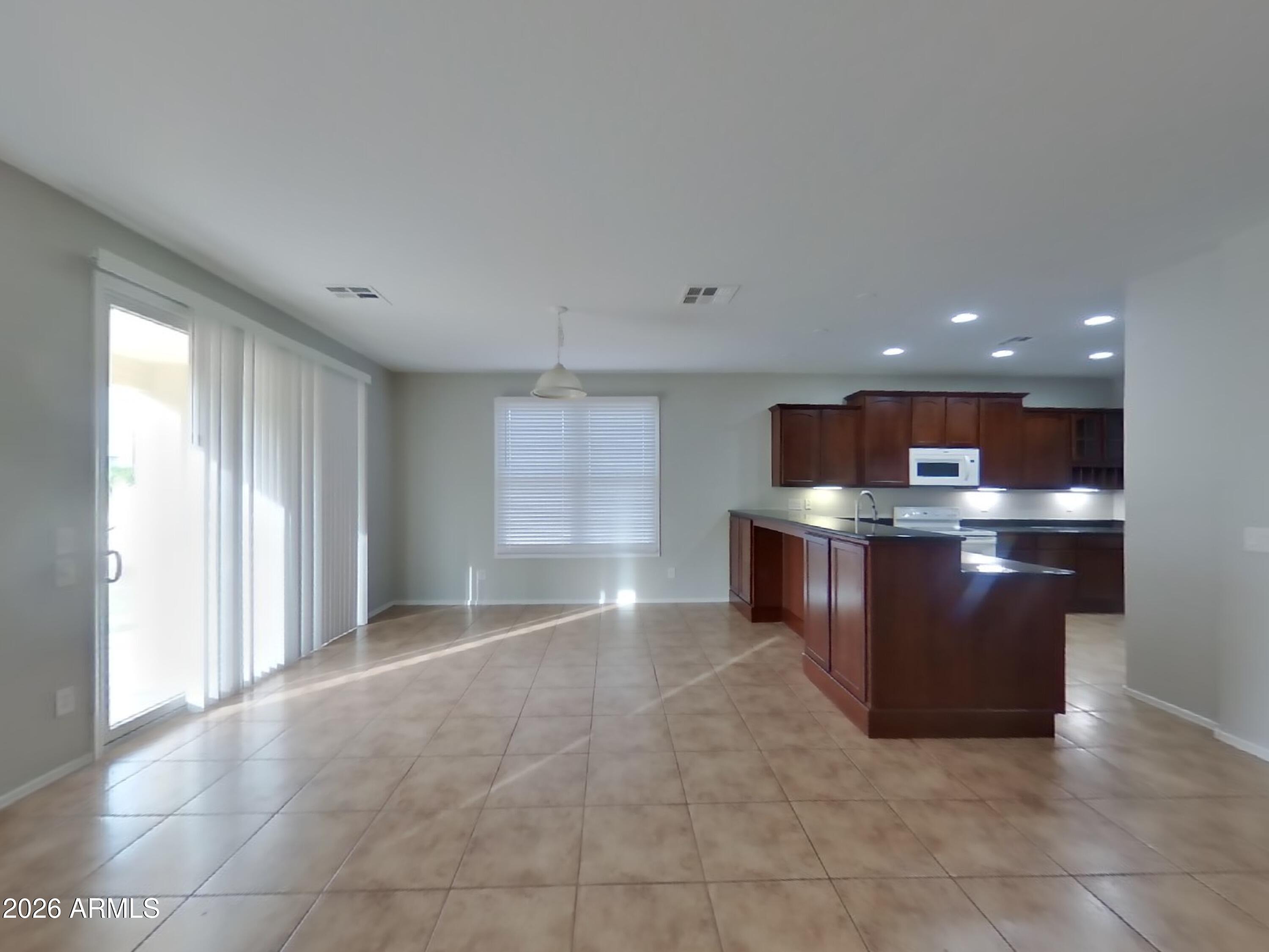 2323 Grenadine Road Phoenix, AZ 85040 - Photo 3 of 21 2_Image_GtiaL3zmu7