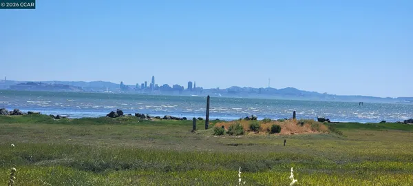 a view of lake and mountain