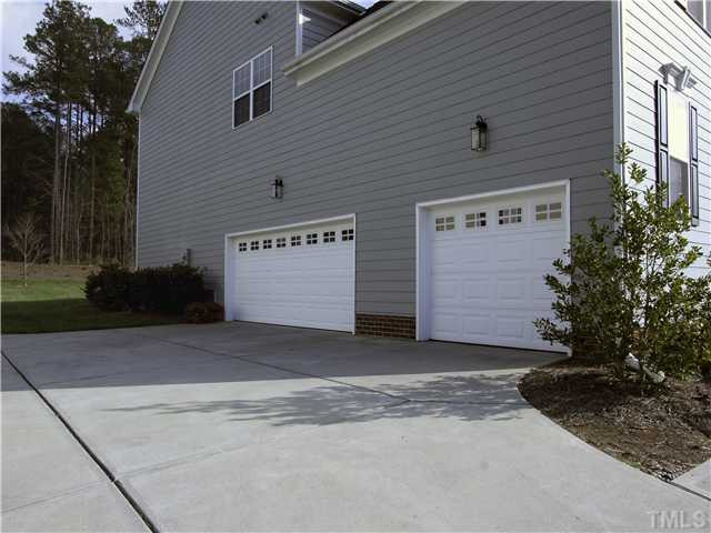 201 Bridle Boast Road Cary, NC 27519 - Photo 23 of 25 Three-car side entry garage.