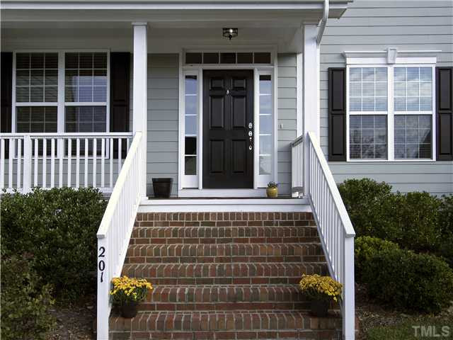 201 Bridle Boast Road Cary, NC 27519 - Photo 3 of 25 Rocking-chair-style front porch.
