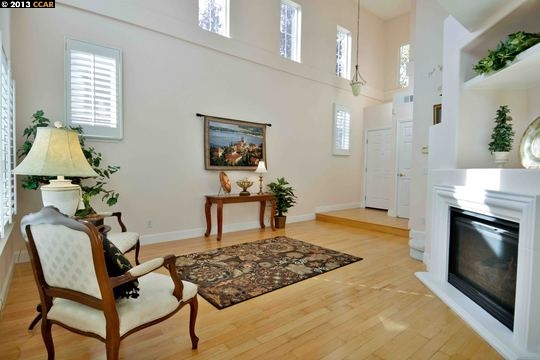 112 Coralflower Lane San Ramon, CA 94582 - Photo 2 of 21 a living room with furniture and a fireplace