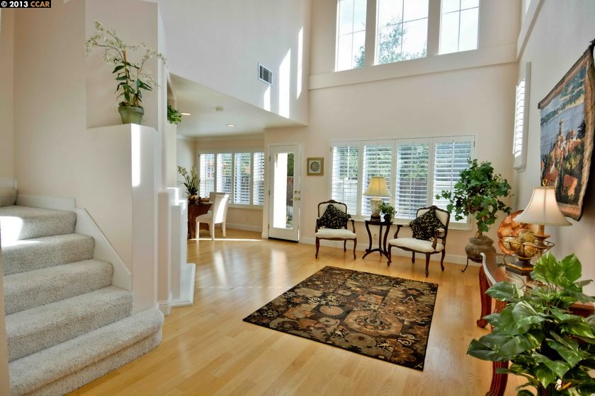112 Coralflower Lane San Ramon, CA 94582 - Photo 4 of 21 a living room with furniture and a large window