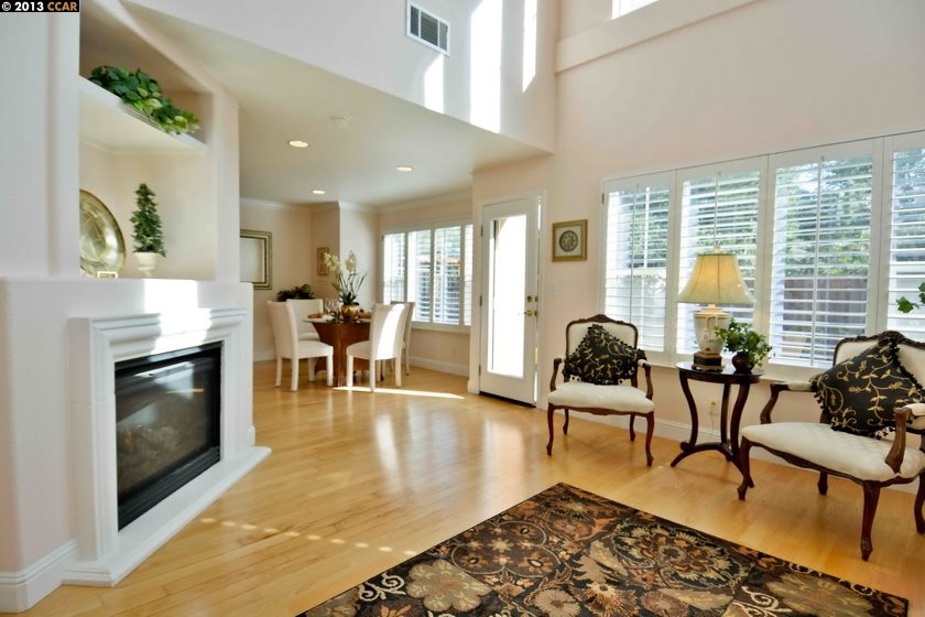 112 Coralflower Lane San Ramon, CA 94582 - Photo 5 of 21 a living room with furniture and a fireplace