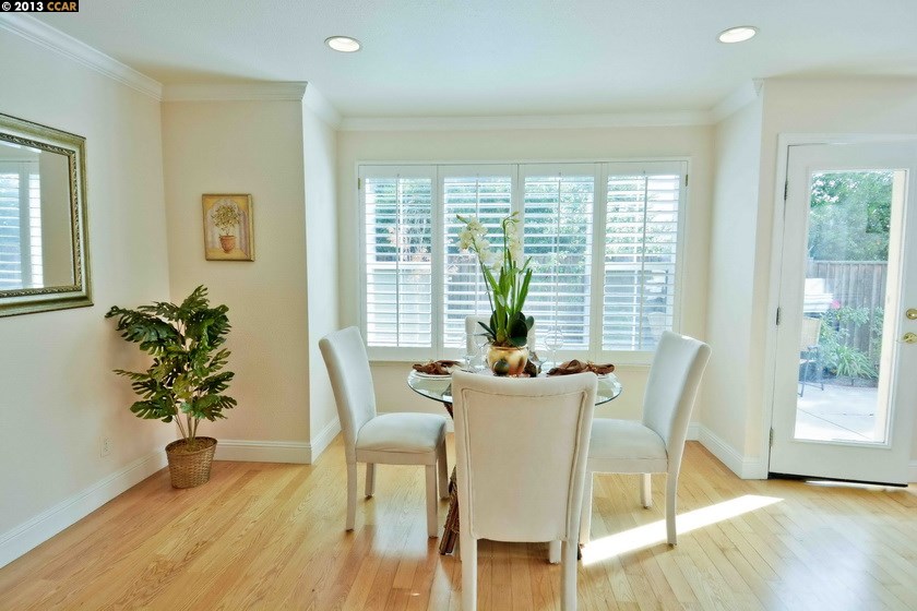 112 Coralflower Lane San Ramon, CA 94582 - Photo 7 of 21 a view of a dining room with furniture window and wooden floor