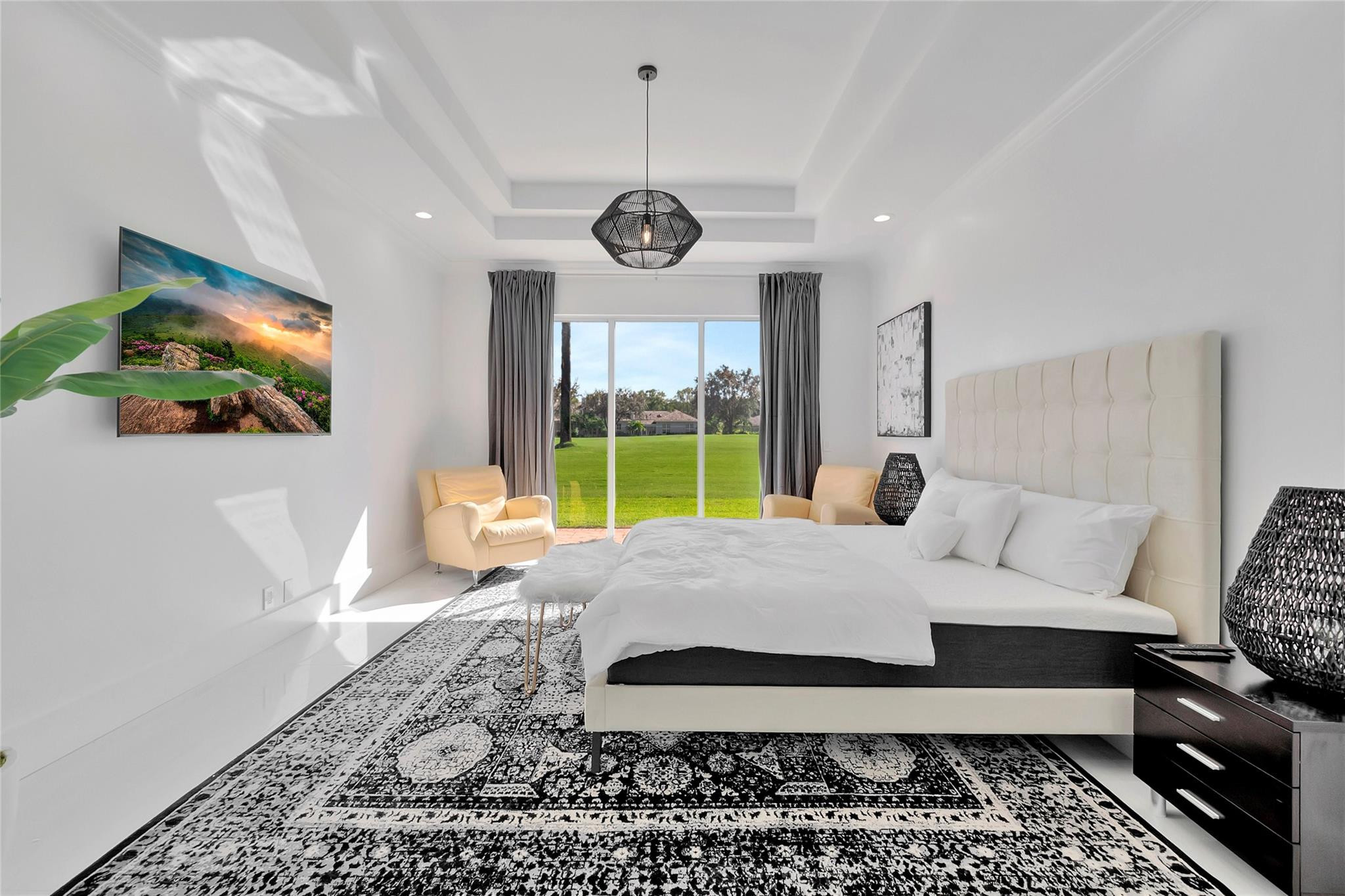 4088 Briarcliff Circle Boca Raton, FL 33496 - Photo 13 of 36 a bed room with a bed window and a television