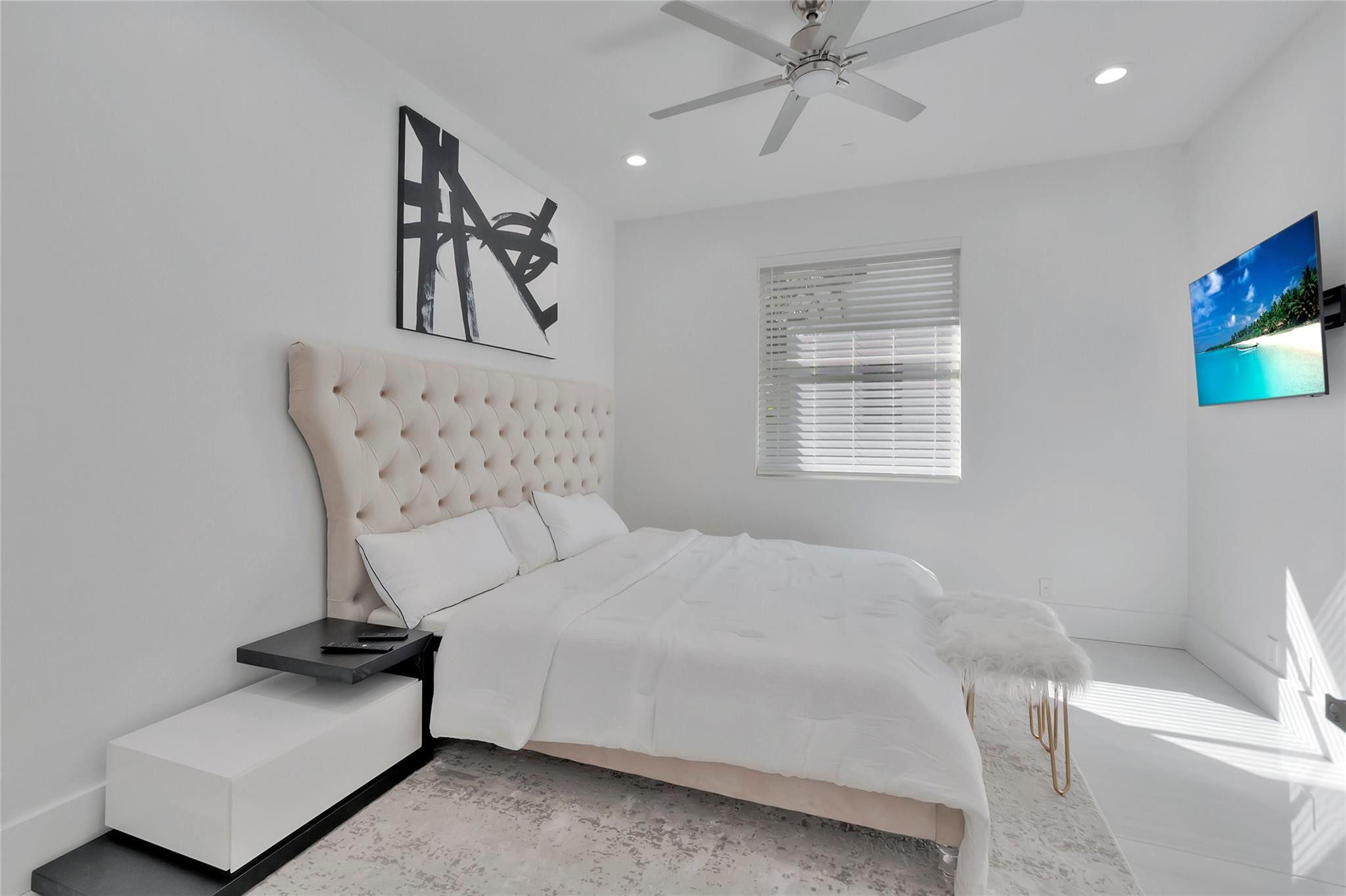4088 Briarcliff Circle Boca Raton, FL 33496 - Photo 19 of 36 a bedroom with a bed and a couch