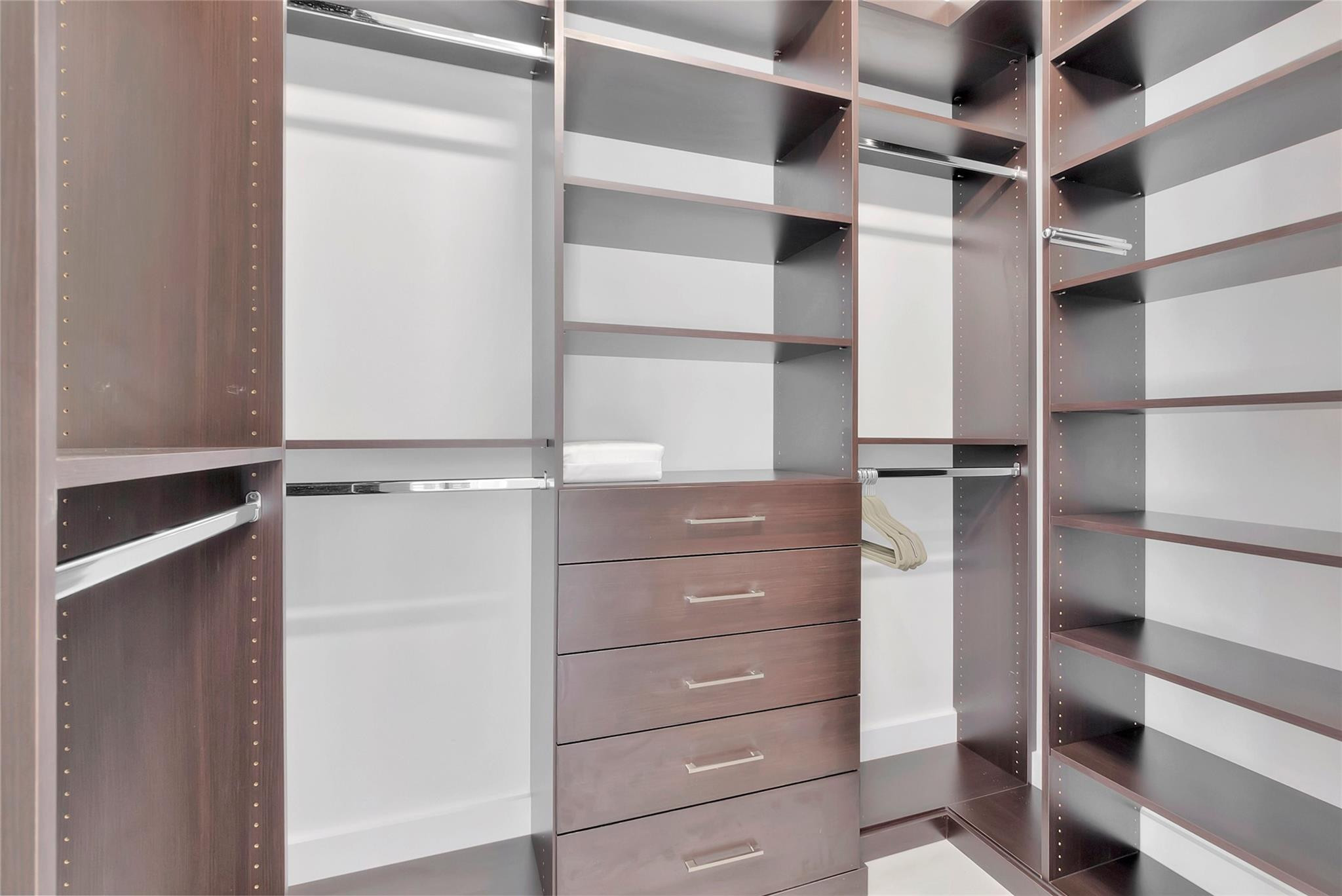 4088 Briarcliff Circle Boca Raton, FL 33496 - Photo 21 of 36 a view of walk in closet with empty racks