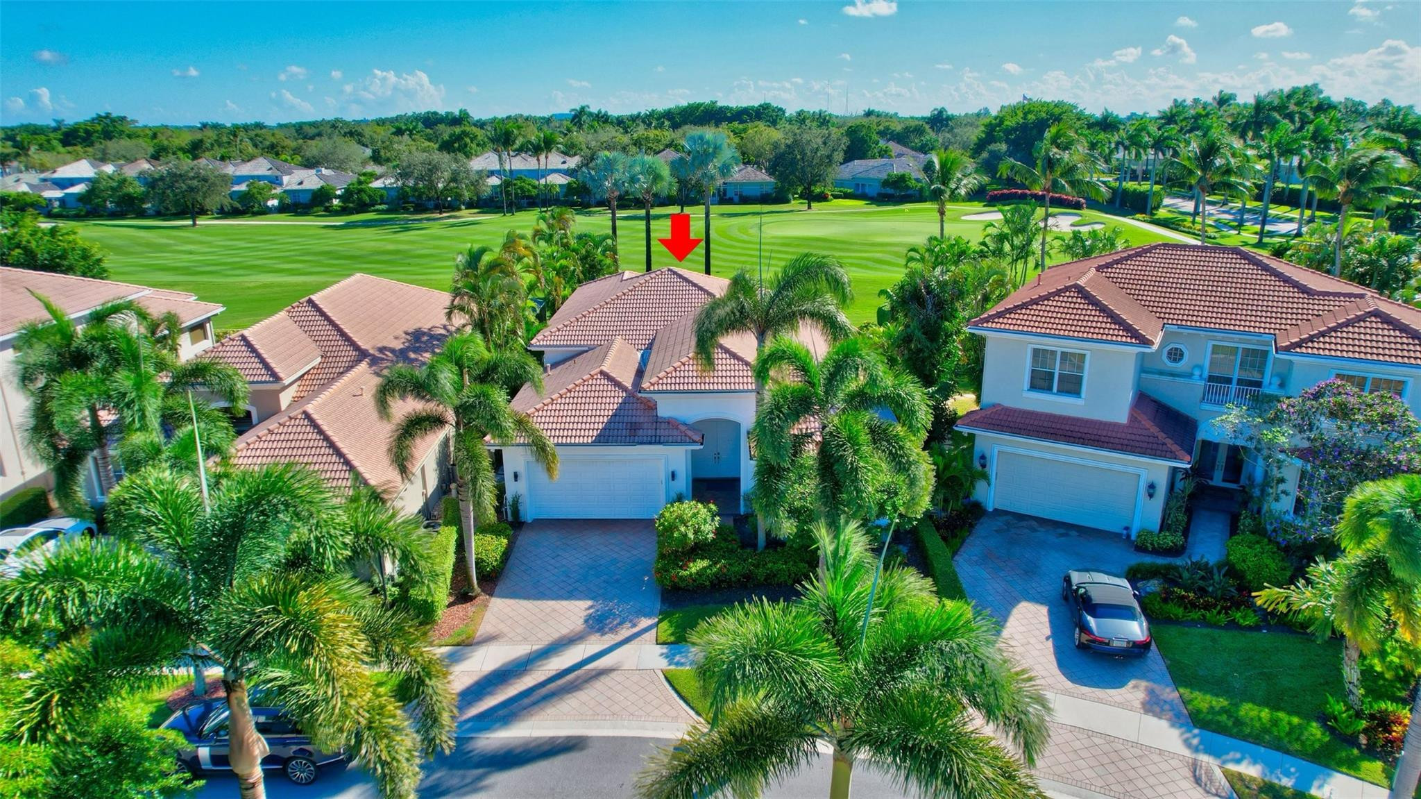 4088 Briarcliff Circle Boca Raton, FL 33496 - Photo 26 of 36 an aerial view of a house with garden space and a patio
