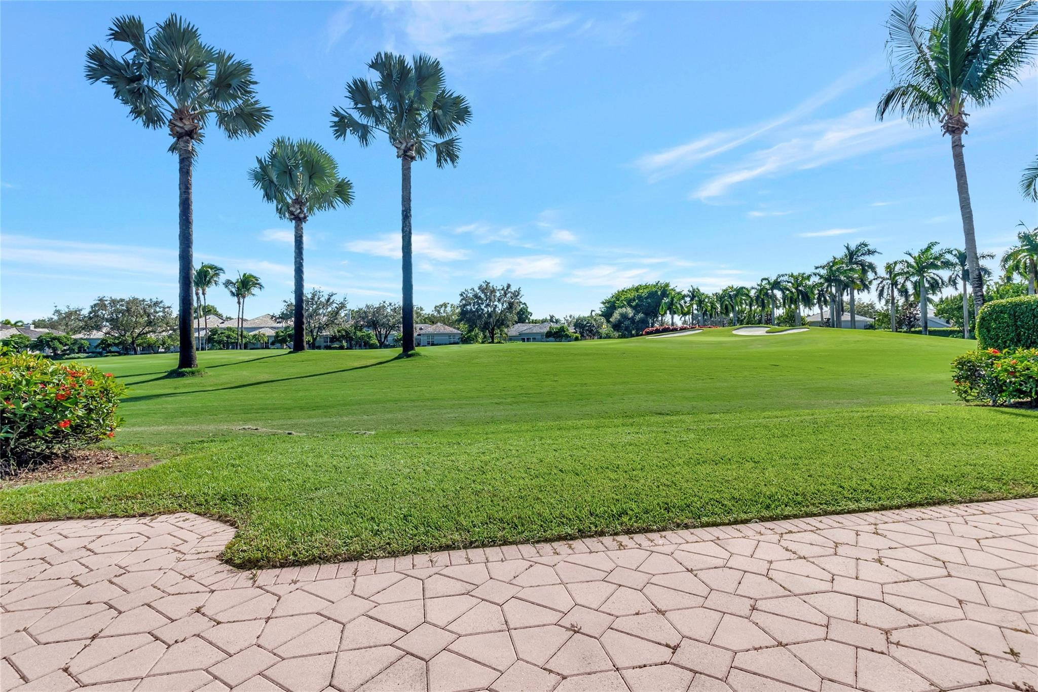 4088 Briarcliff Circle Boca Raton, FL 33496 - Photo 35 of 36 a view of a garden with a palm trees