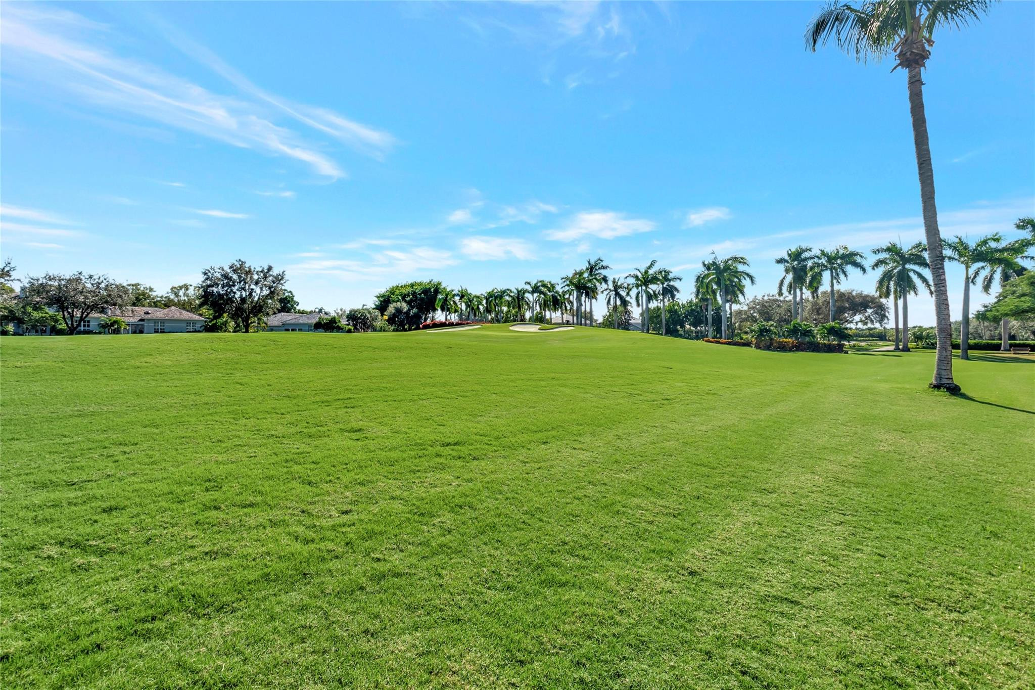 4088 Briarcliff Circle Boca Raton, FL 33496 - Photo 36 of 36 a view of a grassy field with an trees