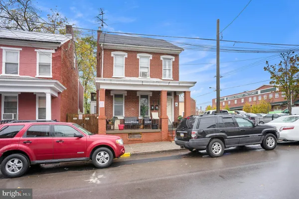 a car parked in front of a house