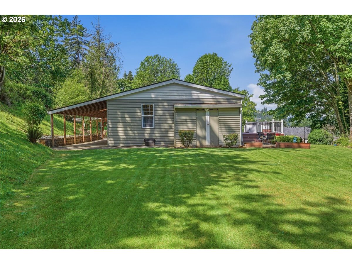 475 East 9th Street Rainier, OR 97048 - Photo 26 of 43 a front view of house with yard and green space