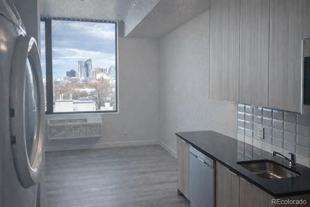 603 Inca Street, Unit 516 Denver, CO 80204 - Photo 14 of 15 a bathroom with a sink and a vanity
