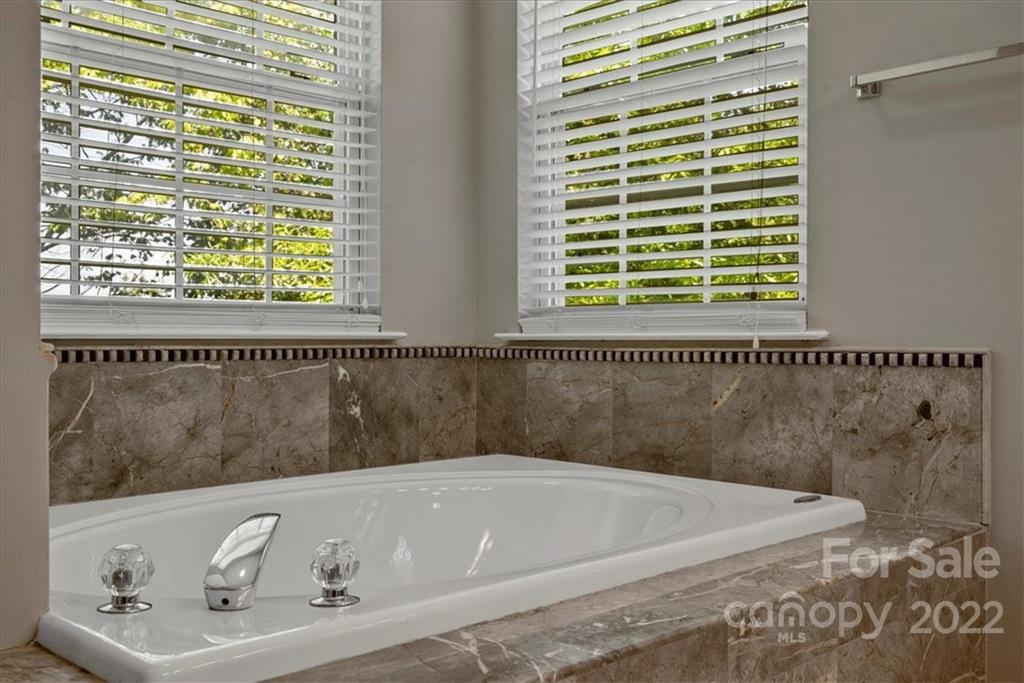 500 Haley Court Fort Mill, SC 29708 - Photo 14 of 20 a bath tub sitting in a bathroom next to a window