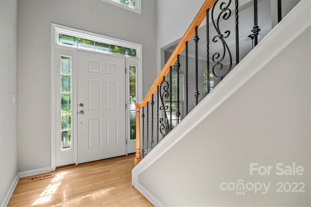 500 Haley Court Fort Mill, SC 29708 - Photo 2 of 20 a view of staircase with wooden floor and stairs