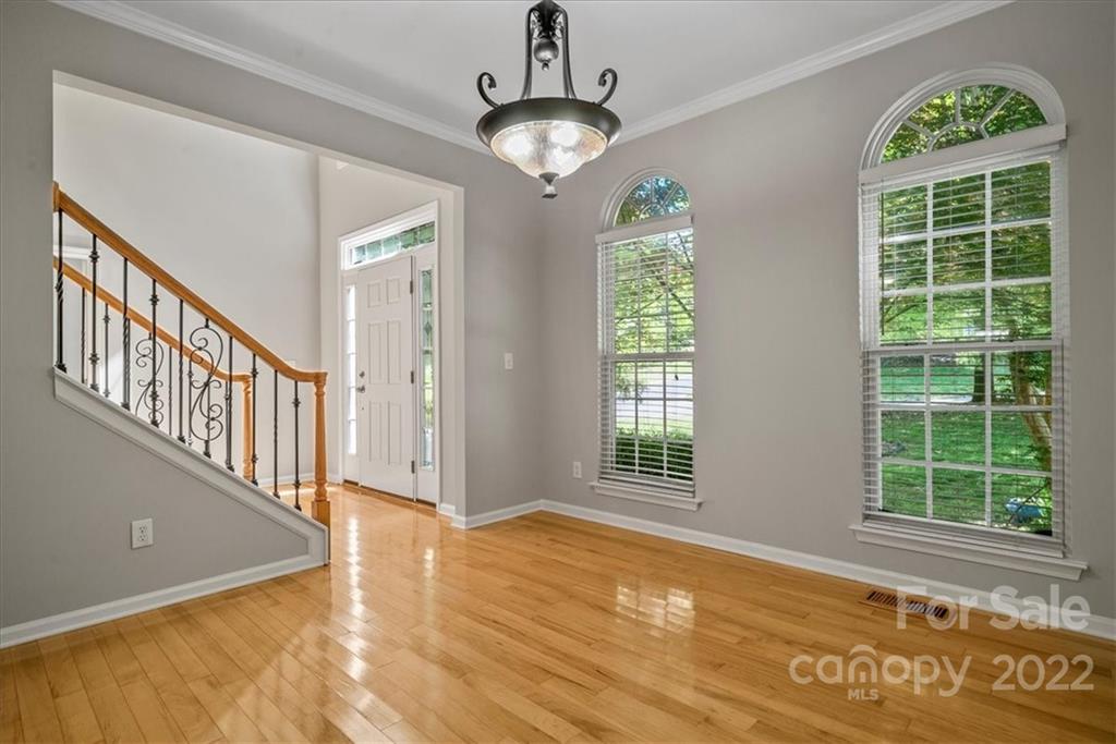 500 Haley Court Fort Mill, SC 29708 - Photo 3 of 20 a view of an empty room with wooden floor and a window