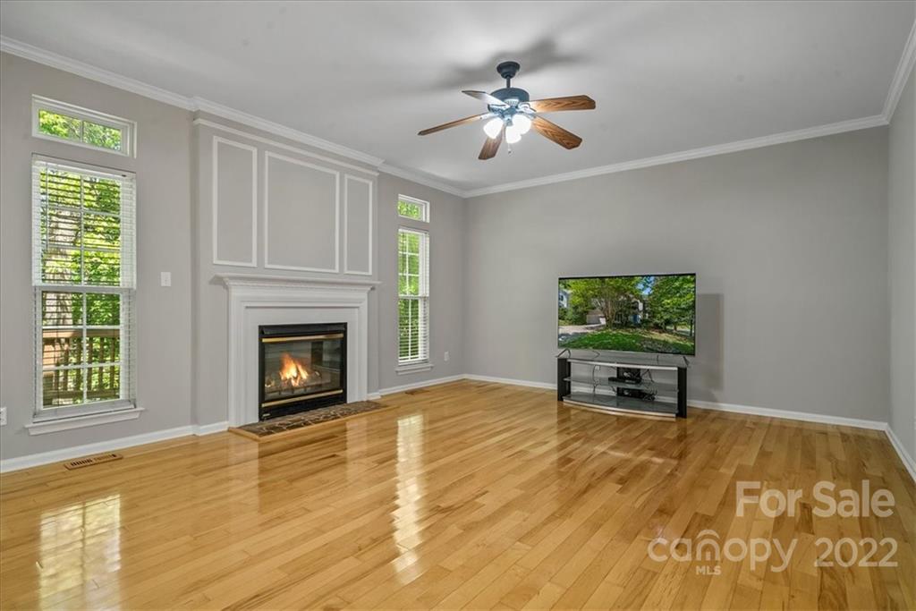 500 Haley Court Fort Mill, SC 29708 - Photo 8 of 20 a view of an empty room with a fireplace and a window