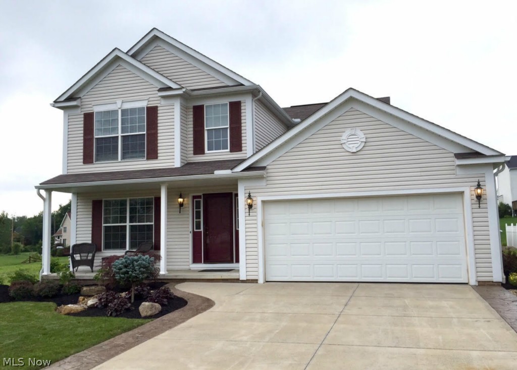 2477 Hazelnut Road Ravenna, OH 44266 - Photo 1 of 25 2477 Hazelnut Rd., Ravenna, Brimfield Township, OH. This charming Colonial has a nicely upgraded driveway and walkway, with stamped and stained concrete borders and gorgeous professional landscaping.