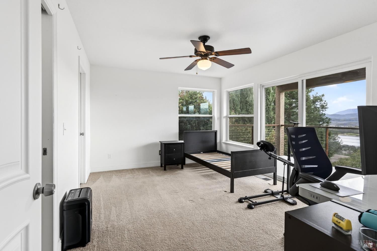 17437 Greenridge Road Hidden Valley Lake, CA 95467 - Photo 12 of 54 a view of a workspace with furniture and a window