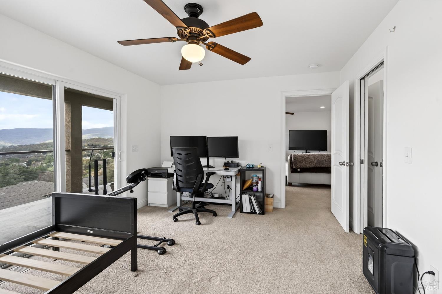 17437 Greenridge Road Hidden Valley Lake, CA 95467 - Photo 14 of 54 a view of a livingroom with workspace and a window