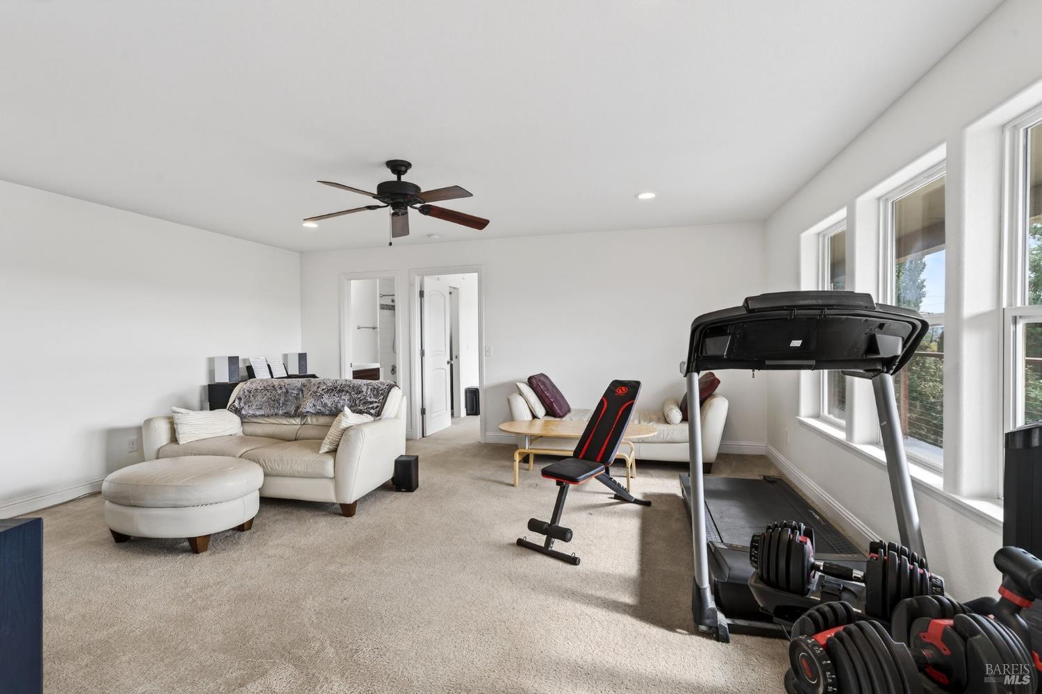 17437 Greenridge Road Hidden Valley Lake, CA 95467 - Photo 15 of 54 a living room with furniture and a chandelier