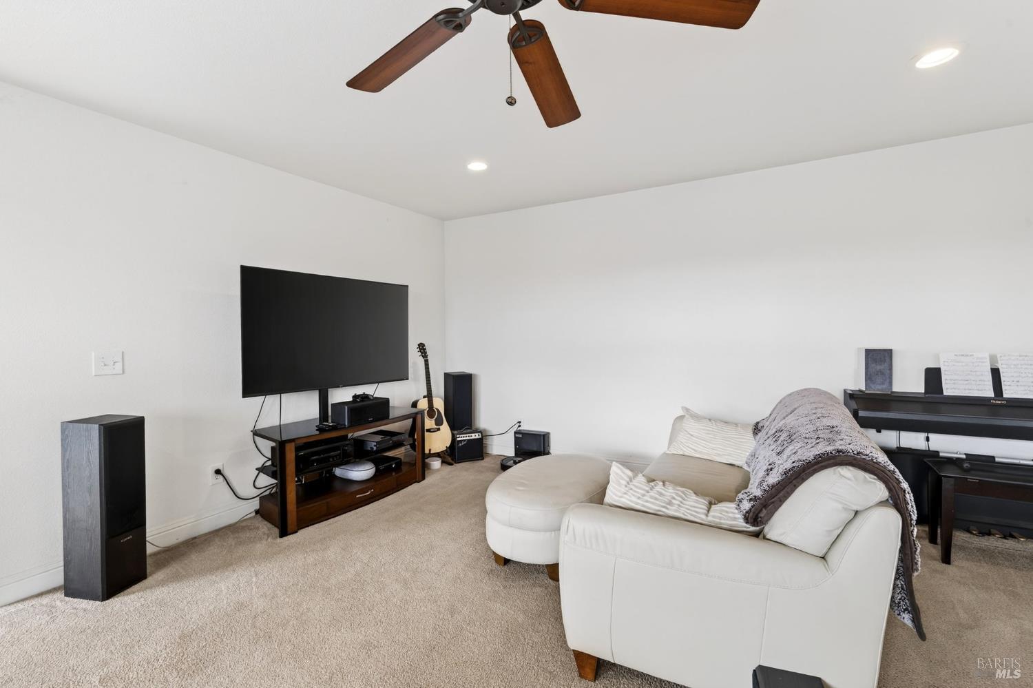 17437 Greenridge Road Hidden Valley Lake, CA 95467 - Photo 16 of 54 a living room with furniture and a flat screen tv